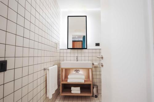 Koupelna v ubytování Aparthotel Colombo Roma