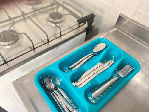 Dapur atau dapur kecil di Kitnet Aconchegante em ambiente Familiar a 100m Praia Camburi com Garagem