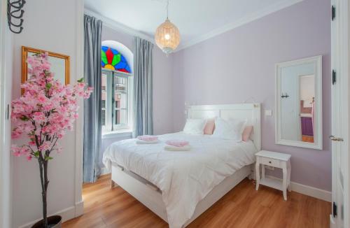 Ένα ή περισσότερα κρεβάτια σε δωμάτιο στο Casa Verde Ayamonte