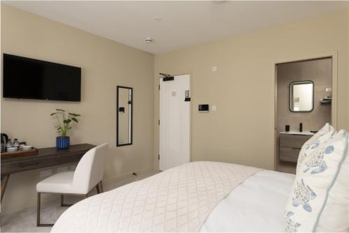 Μια τηλεόραση ή/και κέντρο ψυχαγωγίας στο Kings Road Suites