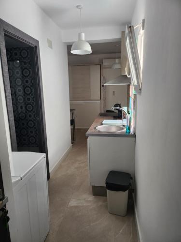 a kitchen with a sink and a counter top at Boomerang in Benidorm