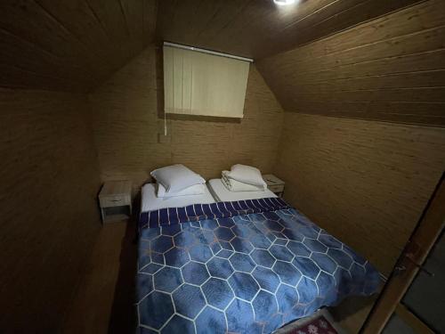 Ένα ή περισσότερα κρεβάτια σε δωμάτιο στο Camping Dragoske