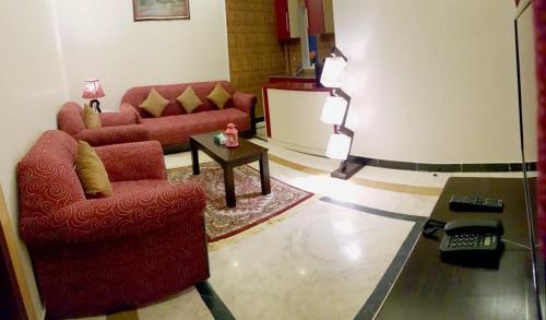 Posezení v ubytování Triple One Hotel Suites