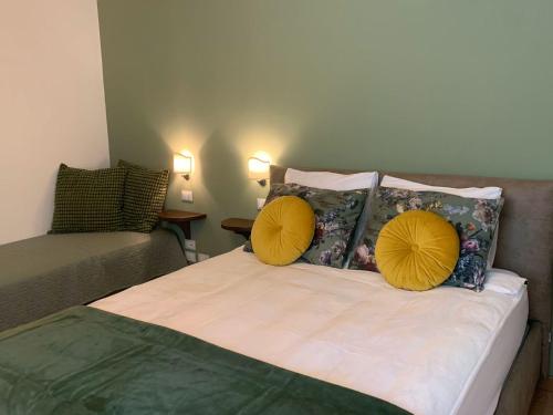 Cama o camas de una habitación en Gastronomic B&B CarloCarla