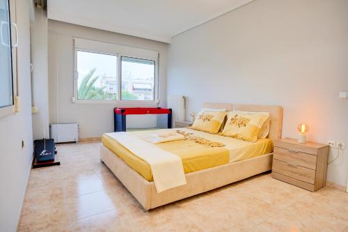 A bed or beds in a room at LOVELY AND SUNNY APARTAMENT 300m FROM BEACH!!