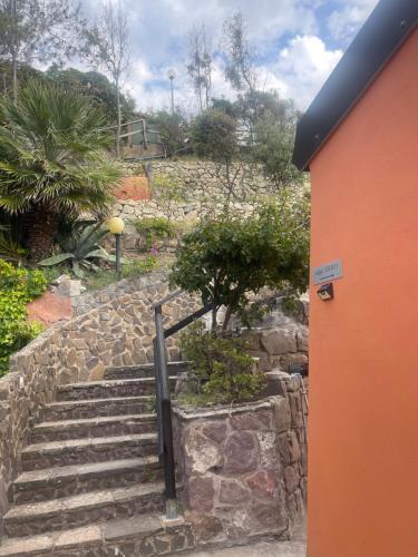 a set of stairs leading up to a building at DOMO A MARE in Magomadas