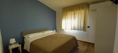 Cama o camas de una habitación en Maresol Residence