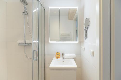 Ένα μπάνιο στο Ferienwohnung Kleiner Sandloper