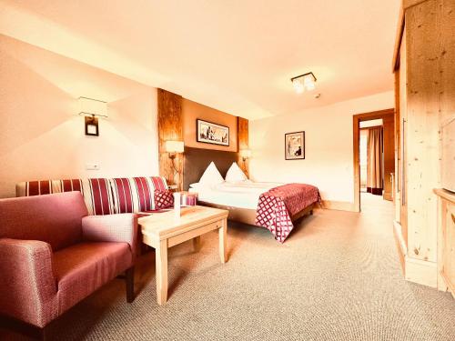 Postel nebo postele na pokoji v ubytování Hotel Das Urbisgut