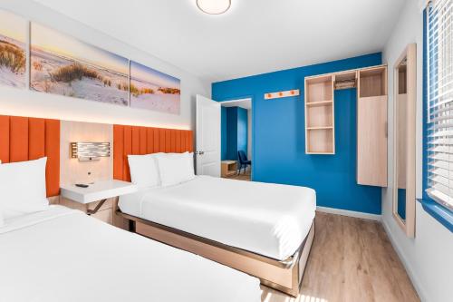Postel nebo postele na pokoji v ubytování Buttercup Suites Wildwood Crest Beach