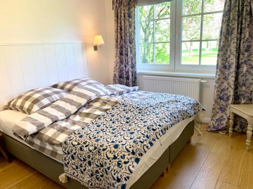 Ένα ή περισσότερα κρεβάτια σε δωμάτιο στο Remise Anker links