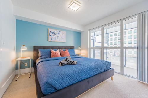 Llit o llits en una habitació de City Suites Toronto Downtown