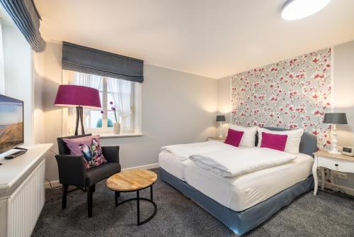 Voodi või voodid majutusasutuse Gaat 7 Coquette toas