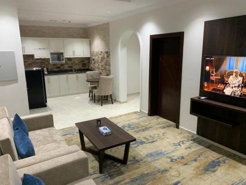 Η κουζίνα ή μικρή κουζίνα στο ســكــورد للــشــقـــق الــفنــدقــيـه Scord Hotel Apartments