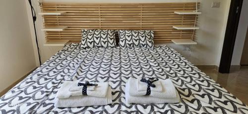Ένα ή περισσότερα κρεβάτια σε δωμάτιο στο Bella Sorella View