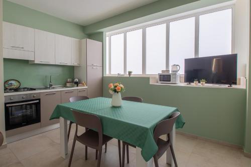 Kuchyň nebo kuchyňský kout v ubytování Onda Bianca Luxury Apartments
