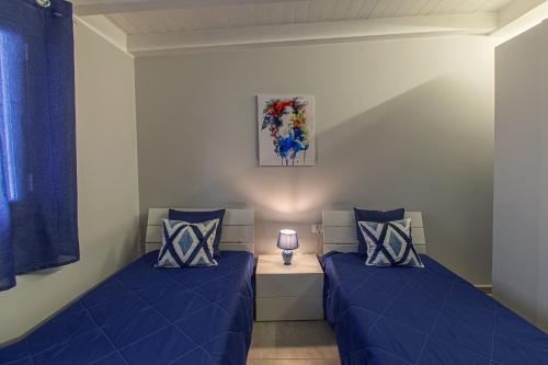 Postel nebo postele na pokoji v ubytování Onda Bianca Luxury Apartments