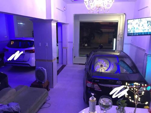 a room with a car with a video game in it at Thuỳ Trang Hotel in Ho Chi Minh City