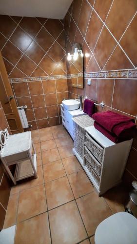 a bathroom with a sink and a toilet in it at BAHIA PALACE 96 in Miami Platja