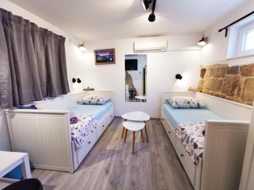 Postel nebo postele na pokoji v ubytování Croparadise Hostel