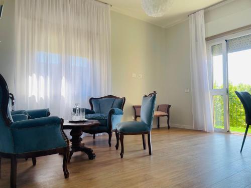Area soggiorno di B&b Comfort Home Apartment