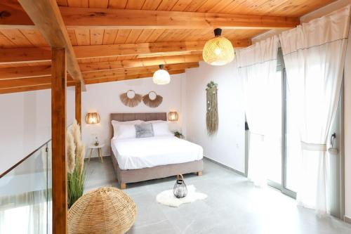 Ένα ή περισσότερα κρεβάτια σε δωμάτιο στο Divine Olivia 2 bedroom Villa