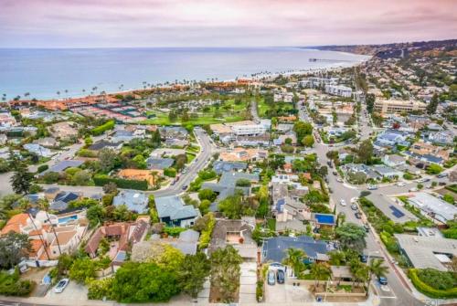 an aerial view of a city with houses and the ocean at La Jolla Retreat in San Diego
