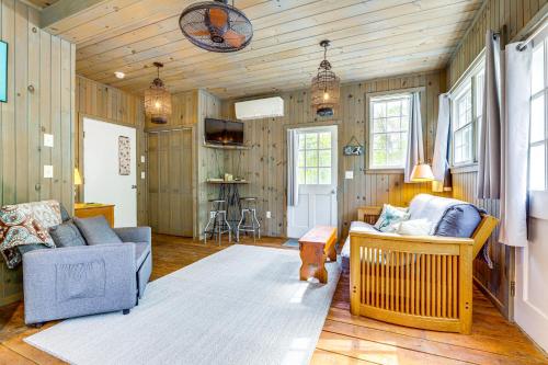 a living room with a couch and a chair at Killingly Barnyard Studio in Wine Country! in Pineville