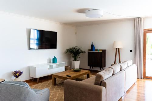 Μια τηλεόραση ή/και κέντρο ψυχαγωγίας στο GALVÃO HOUSE EXPERIENCE
