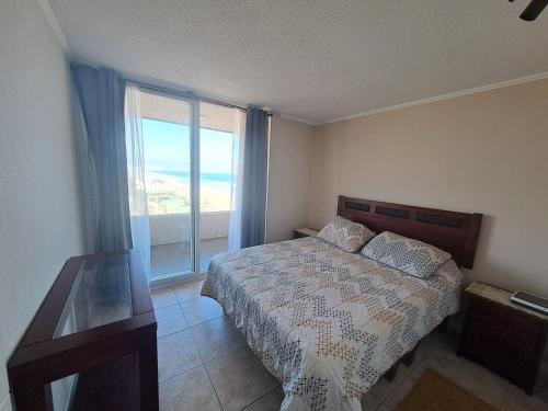 Postel nebo postele na pokoji v ubytování Avenida el Mar linda vista primera linea