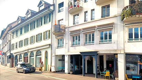 a car parked in front of a building at Aquae Helveticae in Baden