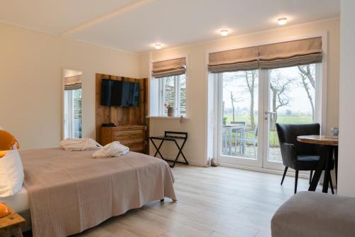 Postel nebo postele na pokoji v ubytování Ferienanlage Landliebe Appartement 3