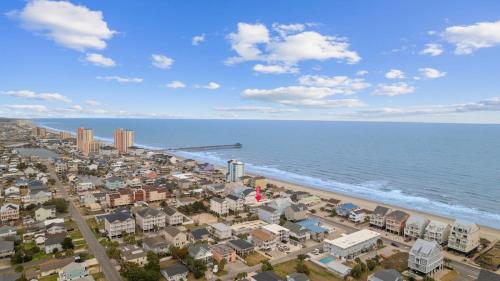 an aerial view of a beach with buildings and the ocean at Cherry Grove efficiency just steps from the beach in Myrtle Beach