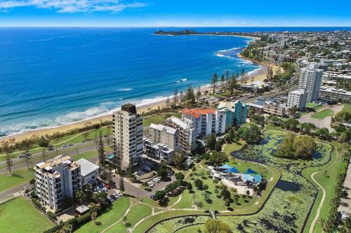 an aerial view of a city and the beach at Meridian Alex Beach Apartments in Alexandra Headland