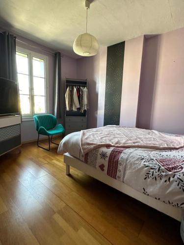 Giường trong phòng chung tại La Maison des Rochettes