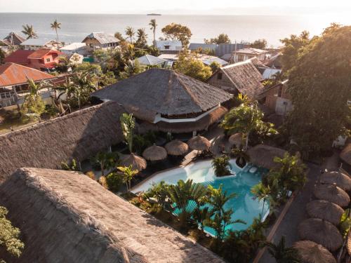 an aerial view of a resort with a swimming pool at Secret paradise moalboal in Moalboal