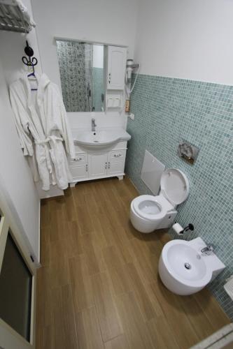 Koupelna v ubytování Espana aparthotel