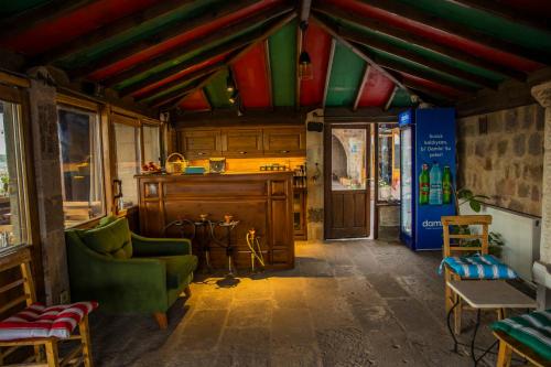 Kuchyň nebo kuchyňský kout v ubytování Carmin Cave Hotel