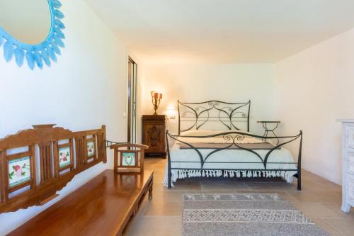 Postel nebo postele na pokoji v ubytování Villa Maffi - spaziosa, vista mare e parcheggio