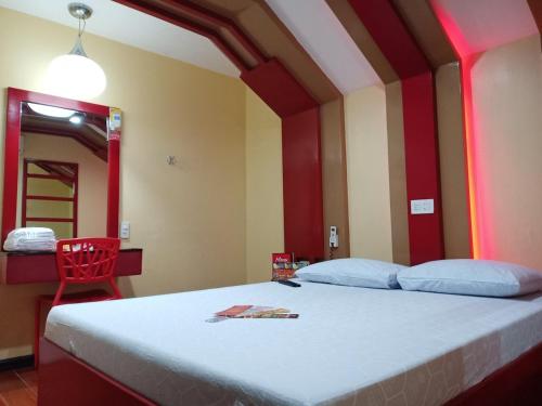 Postel nebo postele na pokoji v ubytování Hotel Sogo Edsa Caloocan