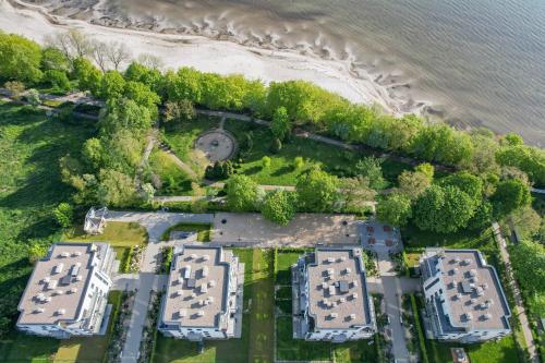 an aerial view of a resort next to a beach at Puck Nexo apartament u Doroty 2os in Puck