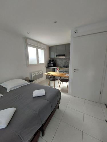 Dapur atau dapur kecil di Les appartements sur Pompidou - 7 appartements neufs société selogerametz com