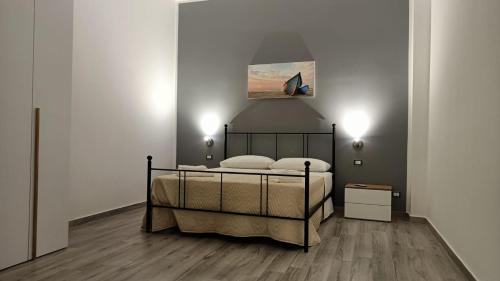 Postel nebo postele na pokoji v ubytování Il Tramonto - BALESTRATE