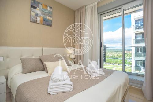 Postel nebo postele na pokoji v ubytování Casa Seabreeze Ivan Luxury Homes 8ªPlta Norte 1ªLínea