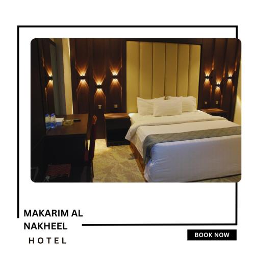 a hotel room with a bed and a table at Makarim Palm Hotel in Rabigh