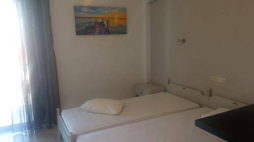 Villa Veneti tesisinde bir odada yatak veya yataklar