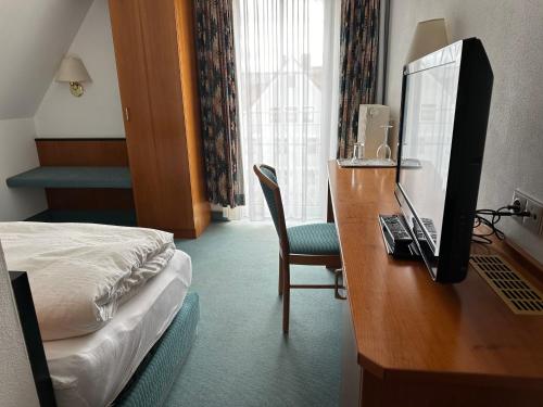 Una cama o camas en una habitación de ST Hotel