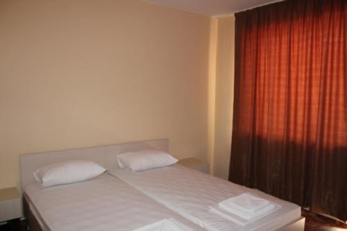 Katil atau katil-katil dalam bilik di Hotel Sapphire