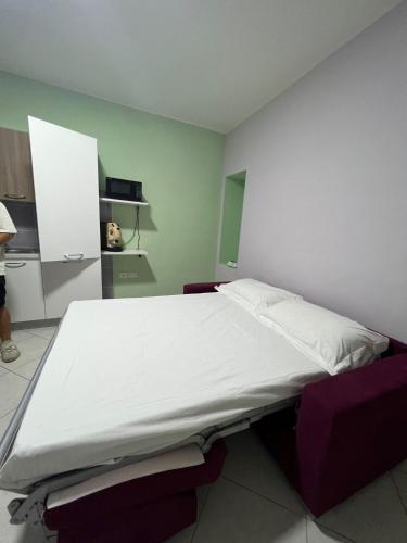 a bedroom with a large bed in a room at PANDORA RELAX in Ottaviano