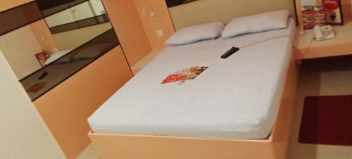 Una cama o camas en una habitación de Hotel Sogo Buendia